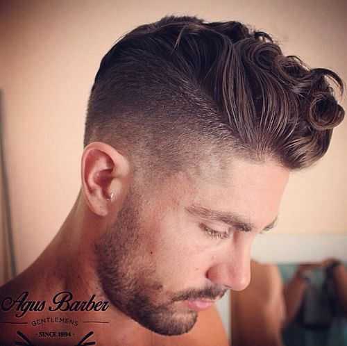Short layered men's haircut with bulk on the top